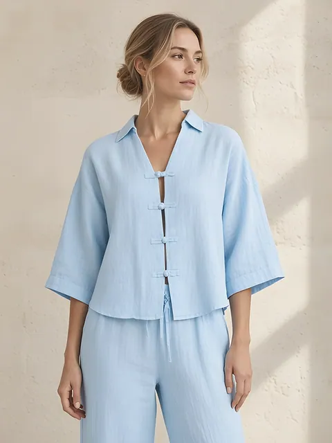 Linnen blouse met knoopsluiting van lusjes – lichtblauw, Linnen · gemaakt in Italië